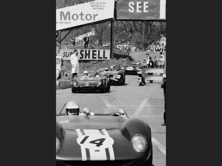 Tony Dean behind the wheel of car no. 14, at the Tourist Trophy Race in Oulton Park, 1966.
