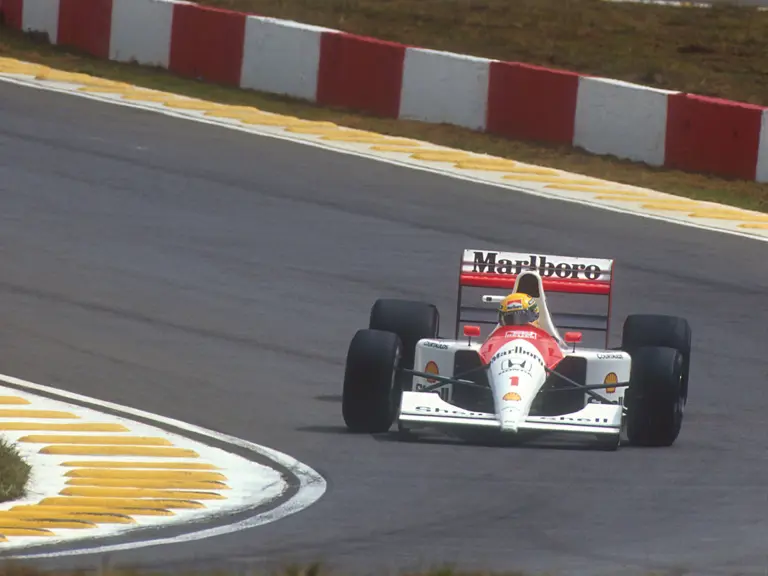Chassis number MP4/6/1 leads a Williams-Renault at the 1991 Brazilian Grand Prix.