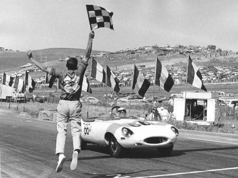 Merle Brennan takes the checkered flag at Laguna Seca, June 9, 1963.