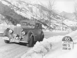 The Bentley R-Type Climbs a snowy hill during the 1953 Monte Carlo Rallye.