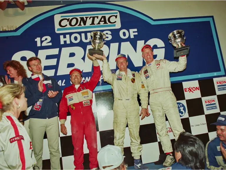 Mark Sandridge and team celebrating a 1st in class finish at the 12 Hours of Sebring, 1994.