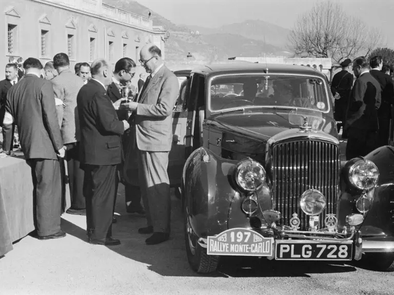 Mike Couper collects the Concours de Comfort trophy having finished 45th overall at the 1953 Monte Carlo Rallye.