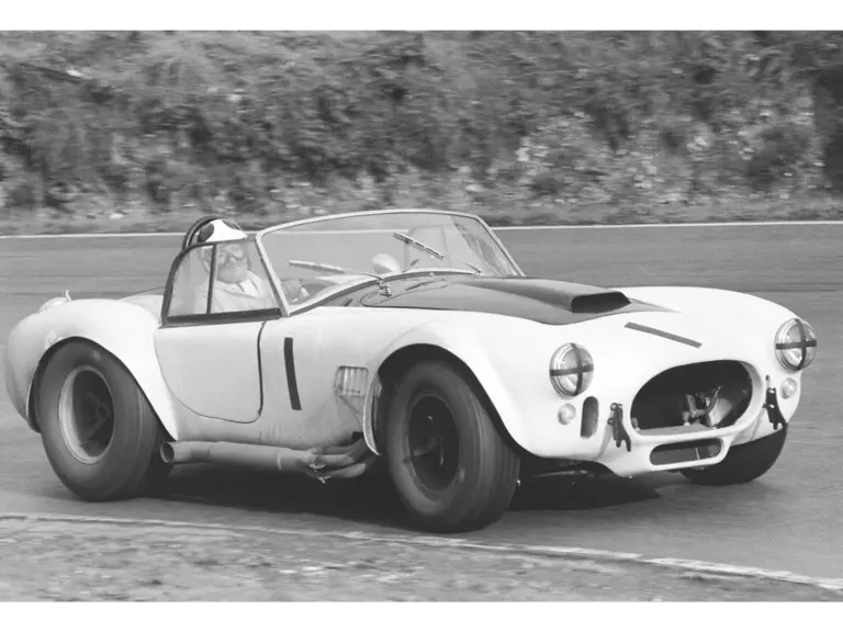 The team of Bob Bondurant and David Piper lead the way at Brands Hatch, 1966.