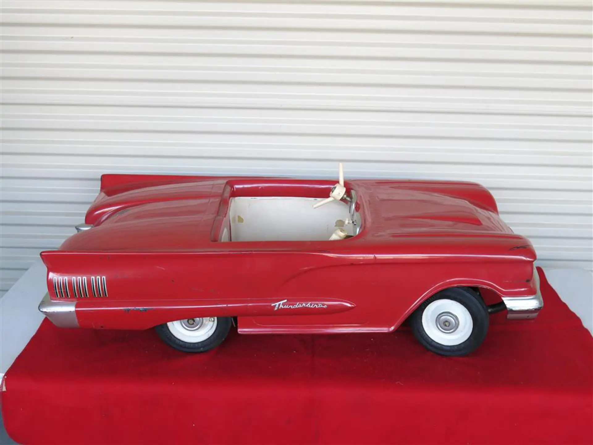 A 1960 Thunderbird Junior child's electric car by Powercar