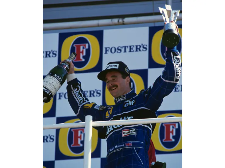 British Grand Prix  Silverstone Circuit, Northamptonshire, England, 1991
Podium Nigel Mansell Williams FW14 wins the race, Gerhard Berger Mclaren-Honda MP4/6 is 2nd and Alain Prost Ferrari 642 3rd
© Formula One Pictures / Picture by John Townsend. Office tele (+36)26 322 826 mobile (+36) 70 776 9682. UK Mobile +44 7747 862606 www.f1pictures.com.
Vat Number 221 9053 92
 
 
