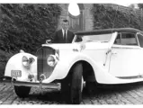 The legendary Belgian racer Olivier Gendebien proudly poses with the Bentley, which he owned and cherished for many decades.