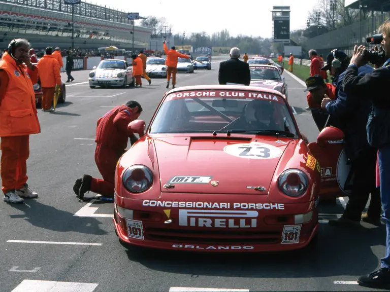 The Porsche is readied on the grid at Monza for a race in 1997.