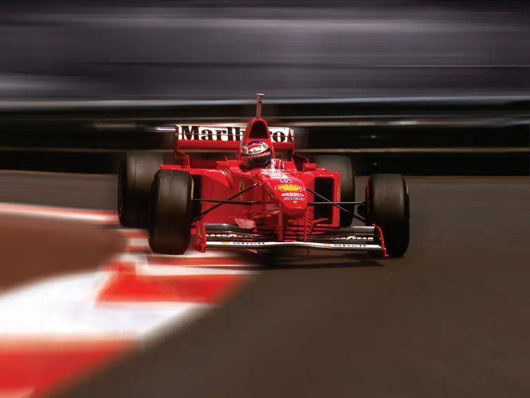 1997 Monaco Grand Prix.
Monte Carlo, Monaco.
8-11 May 1997.
Michael Schumacher (Ferrari F310B) 1st position, at the penultimate corner of Piscine.
Ref-97 MON 34.
World  Copyright - LAT Photographic