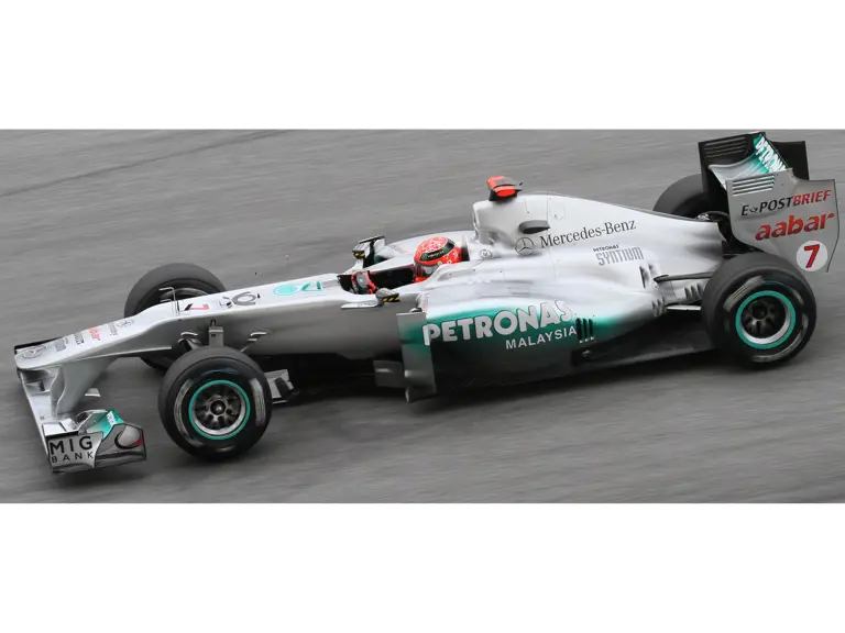 Michael Schumacher racing at the 2011 Malaysian Grand Prix. This image is for reference purposes only.