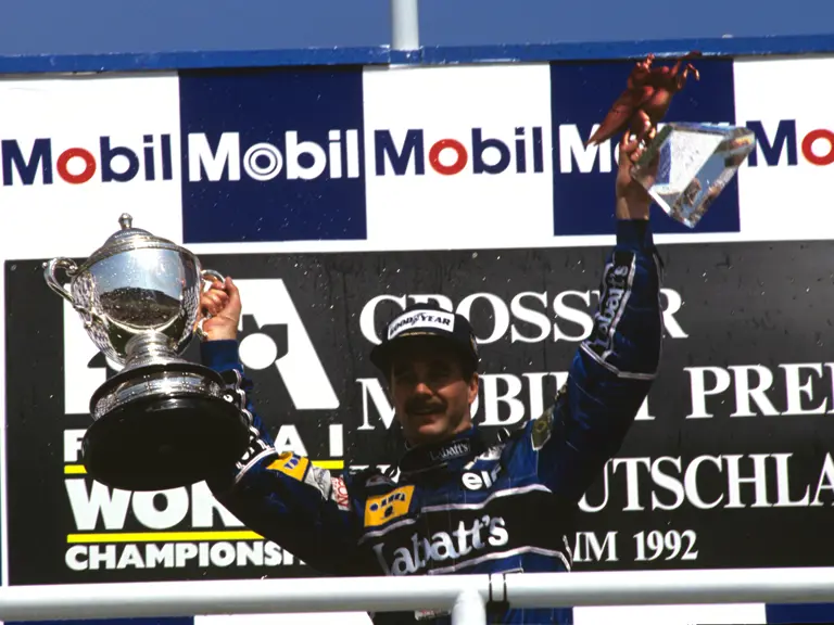 German Grand Prix, Hockenheim Germany 1992 
Podium Nigel Mansell Williams FW 14b wins the race Ayrton Senna Mclaren-Honda MP4/7A  is 2nd and Michael Schumacher Benetton-Ford B192 is 3rd
© Formula One Pictures / Picture by John Townsend.  jt@f1pictures.com www.f1pictures.com. Tel +36 70 776 9682 Vat No UK 221 9053 92.
 
