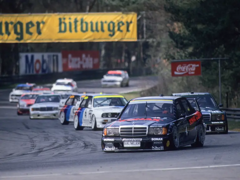 Bernd Schneider’s 190 E 2.5-16 Evolution II is captured at the forefront of the grid at Zolder on 5 April 1992, contesting the DTM series.