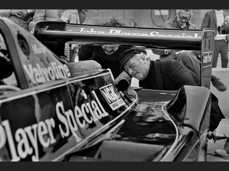 Colin Chapman inspects Mario Andretti’s pole-setting #5 Lotus 79 at the US Grand Prix, Watkins Glen, 1978.