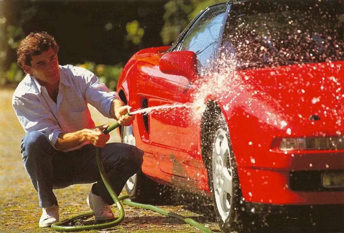 Ayrton Senna washing his 1991 Honda NSX