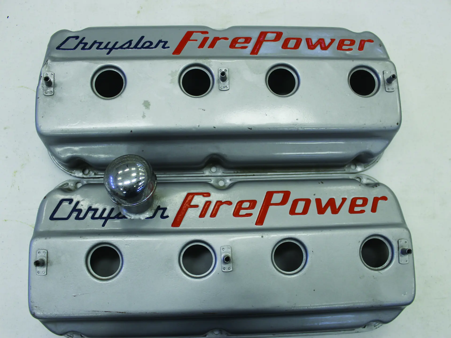 Pair of Chrysler firepower valve covers | Auburn Fall 2017 | RM Sotheby's