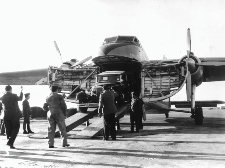 83807 being unloaded from the cargo plane in Iraq following its restoration for King Faisal in 1958.
