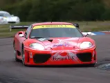 011 M as seen during the ninth round of the 2003 British GT Championship at Thruxton, where it placed second overall and second in class.