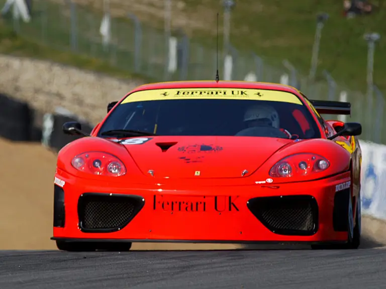 011 M at speed during the first round of the 2002 British GT Championship at Brands Hatch, where it finished fourth overall and third in class.
