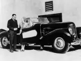 Buck Jones and Helen Twelvetrees pose with 1000459 on the Monogram Studios Lot, 1939.