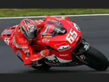 Loris Capirossi at speed during qualifying practice at the 2006 Grand Prix of Japan.