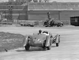 Rob Walker behind the wheel of ‘DUV 870’ at the 1939 BARC Meeting at Brooklands. Walker took 1st place at the Mountain Handicap event.