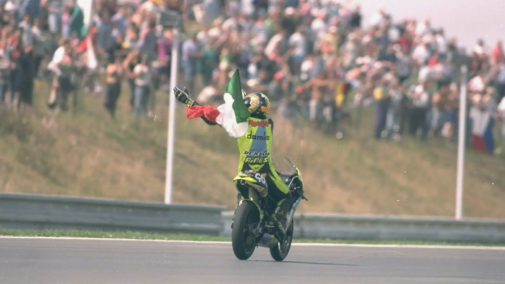 Valentino Rossi on his first career celebration lap having won the 1996 Czech Grand Prix with chassis 1291195.