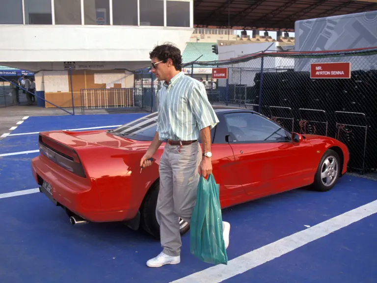 Ayrton Senna arrives at Circuito Estoril for the 1991 Portuguese Grand Prix in his Honda NSX.
