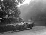 The Jayson-Henry/Rolt Delahaye fielded by Rob Walker darts out of Tetre Rouge at the 1949 24 Hours of Le Mans.