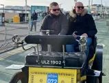 The De Dion-Bouton is pictured participating in the London to Brighton Veteran Car Run.