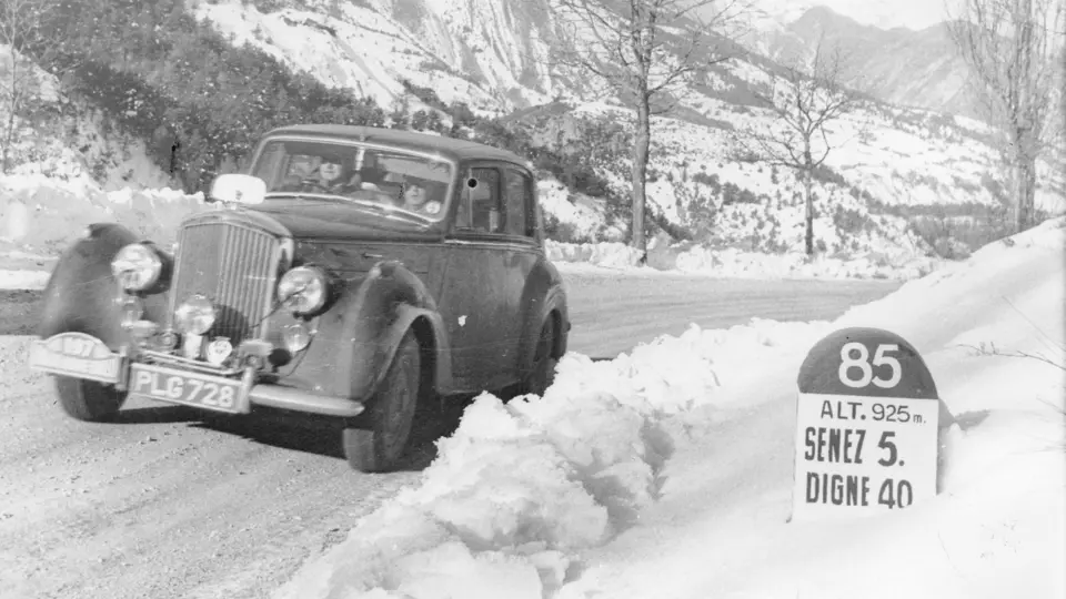 The Bentley R-Type Climbs a snowy hill during the 1953 Monte Carlo Rallye.
