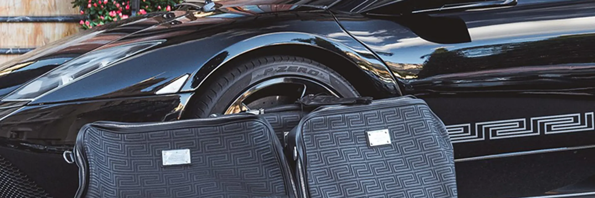 2008 Lamborghini Murciélago LP6404 Coupé Versace EGear and matching luggage set offered at RM Sothebys Paris Auction 2021
