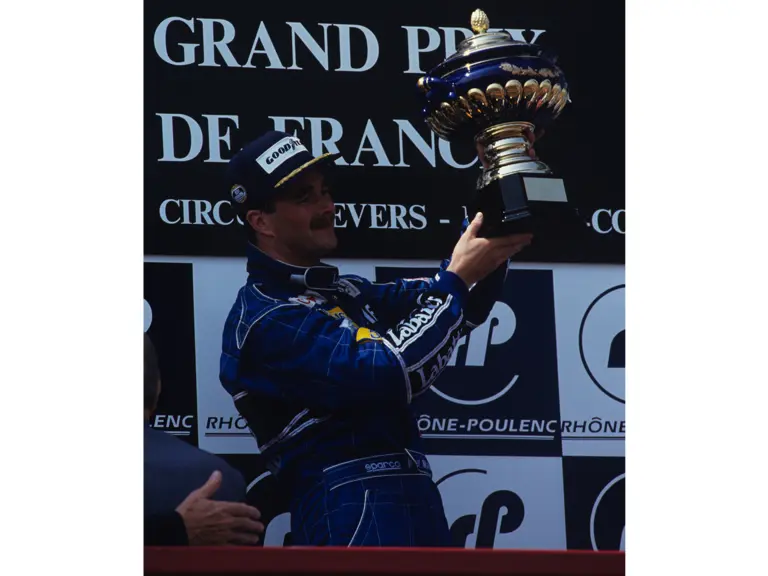 French Grand Prix, Magny-Cours, France. 1991 
Podium Nigel Mansell Williams FW 14 wins the race, Alain Prost Ferrari 642 is 2nd and Ayrton Senna Mclaren-Honda MP4/6 3rd
© Formula One Pictures / Picture by John Townsend.  jt@f1pictures.com www.f1pictures.com. Tel +36 70 776 9682 Vat No UK 221 9053 92.
 
