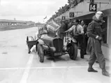 DUV 870 seen here in the Brooklands pit lane during the 3 Hour Light Car Club race, which Jay Willing and Ronnie Jarvis won.