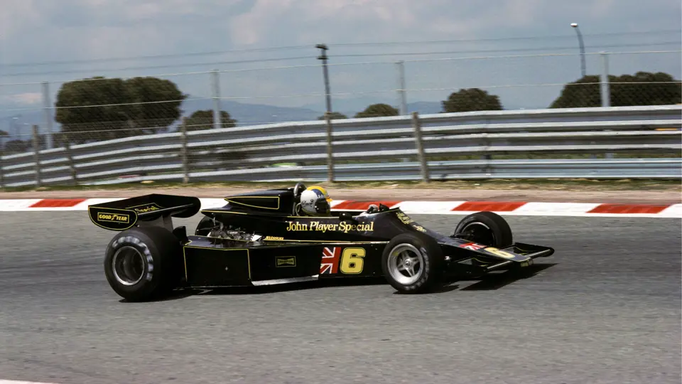 Mario Andretti in his Lotus 77 races at the 1976 Spanish Grand Prix. This image is for reference purposes only.