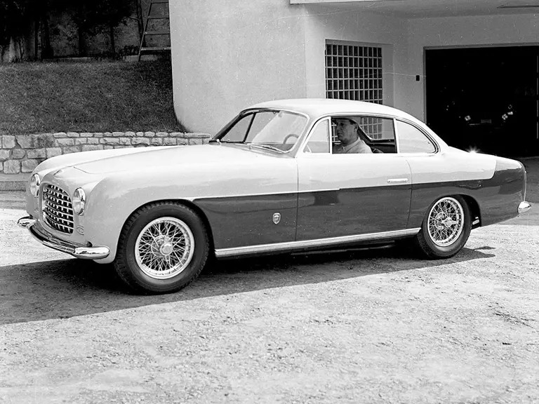 Argentinian President Juan Perón poses with his 212 Inter, believed to be outside of Casa Rosada in Buenos Aires.