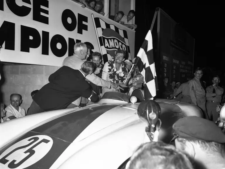 Carroll Shelby and Phil Hill celebrate their perceived victory in the 1955 12 Hours of Sebring before their result was overturned, leaving them in second place overall.