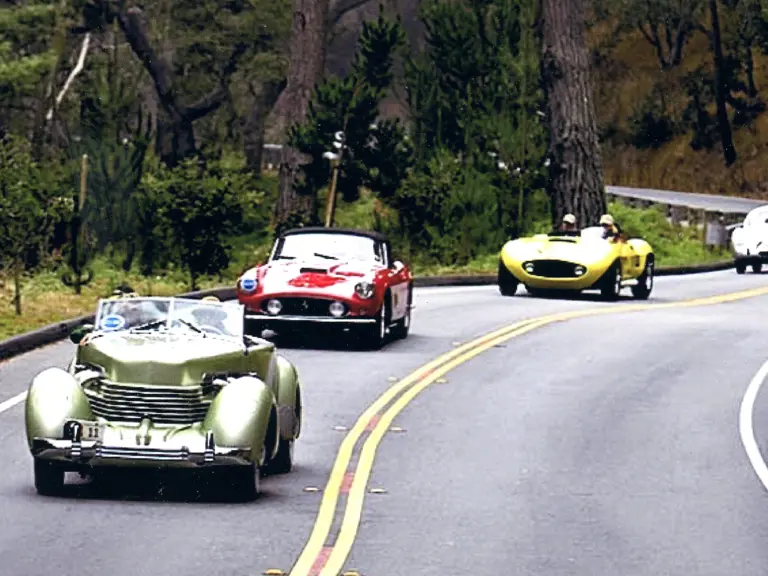 Ric Simpson driving his Cord on the Pebble Beach Tour d'Elegance in 2008.