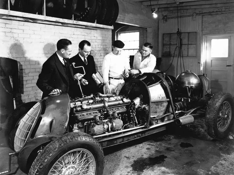 Engine number 50012, pictured in its original chassis, is fitted with a set of new Bowes Seal Fast spark plugs before the 1937 Indianapolis 500.