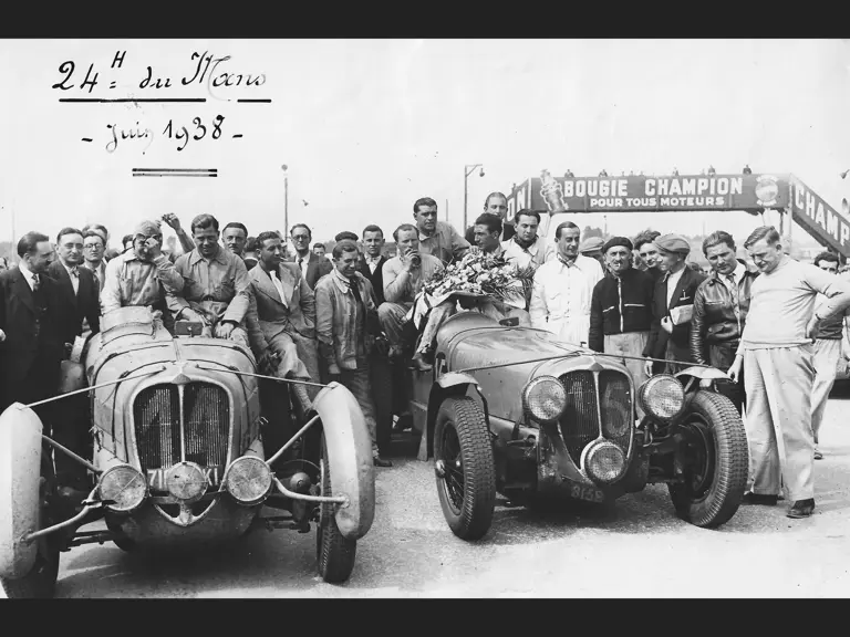 Serraud and Cabantous with chassis 46084, alongside Chaboud and Tremoulet with sister car, chassis 47190, to the right, following a stunning 1-2 Delahaye finish at the 1938 24 Hours of Le Mans. 