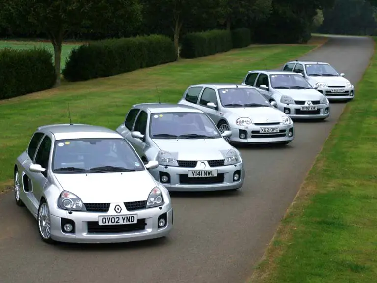Five of TWR's development Renault Clios lined up outside its workshop. Chassis ‘7’ can be seen second from the back.