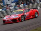 011 M as seen during the ninth round of the 2003 British GT Championship at Thruxton, where it placed second overall and second in class.