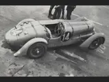 Seen from above the pit lane at the 1938 24 Hours of Le Mans, the Delahaye would be driven to a 2nd-place finish.