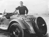 Three time Le Mans winner and Formula 1 World Champion Phil Hill poses with chassis 10814362 which he owned for 30 years.