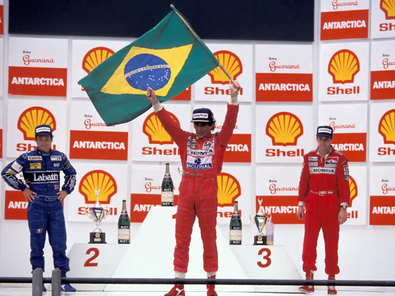 Ayrtona Senna celebrating his win at the 1991 Brazilian Grand Prix.