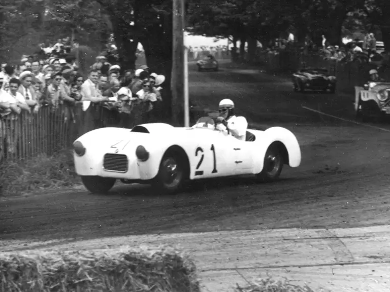 The BMW is driven by E.J. Tobin at the SCCA National Bridgehampton Road Races in May 1952. The car can be seen passing Dave Garroway’s Jaguar SS 100 and the Ferrari 212 of Charles Moran.