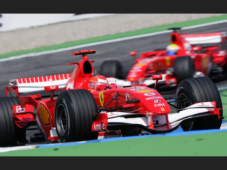 Michael Schumacher leads his teammate Felipe Massa en route to victory at the 2006 German Grand Prix.