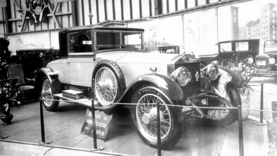 The coachwork now worn by chassis 49RE is seen fitted to chassis 5CB, which was exhibited on the Dansk Karosseri Fabrik show stand at the 1927 Forum Copenhagen. The coachwork now worn by chassis 49RE is seen fitted to chassis 5CB, which was exhibited on the Dansk Karosseri Fabrik show stand at the 1927 Forum Copenhagen.