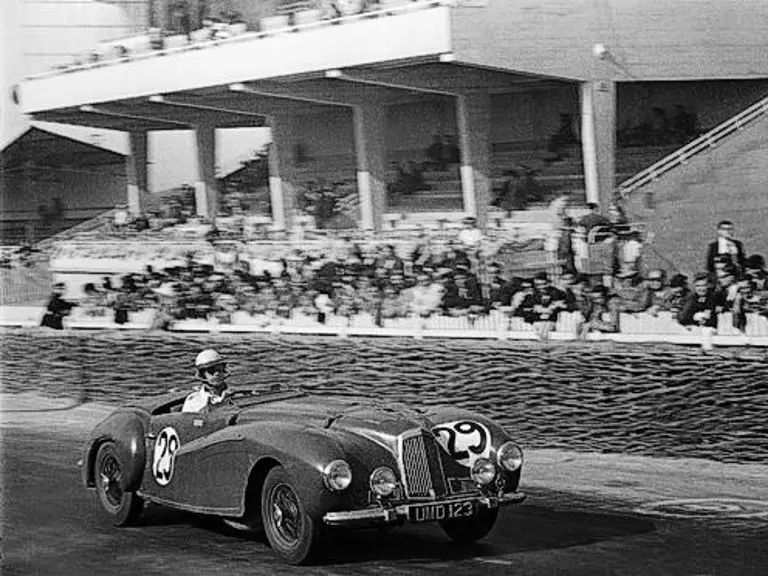 Dashing down the home straight at the 1949 24 Hours of Le Mans.