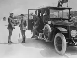King George V and Edward VIII, Prince of Wales, are seen exiting the Rolls-Royce as they are greeted by General Julian Byng on arrival at Butte de Warlencourt near Le Sars, France, during World War I.