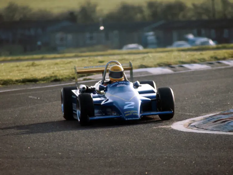 Ayrton Senna at speed in the Ralt RT3 during the British Formula 3 race at Thruxton in November 1982, where he finished first.