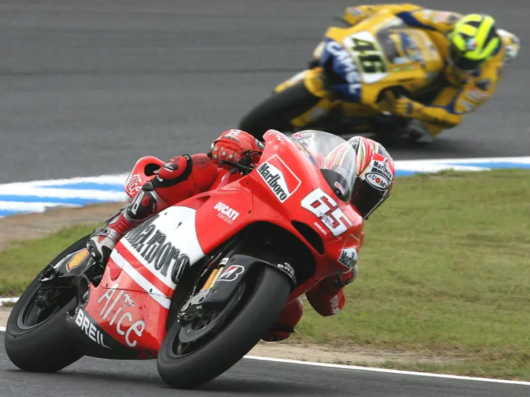 Loris Capirossi leads Valentino Rossi during qualifying practice at the 2006 Grand Prix of Japan.